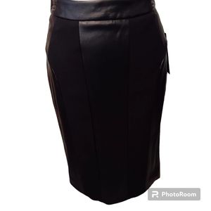 Jet black knee length faux leather stripped skirt -- size 4